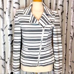Asymmetric zip up grey and white blazer.